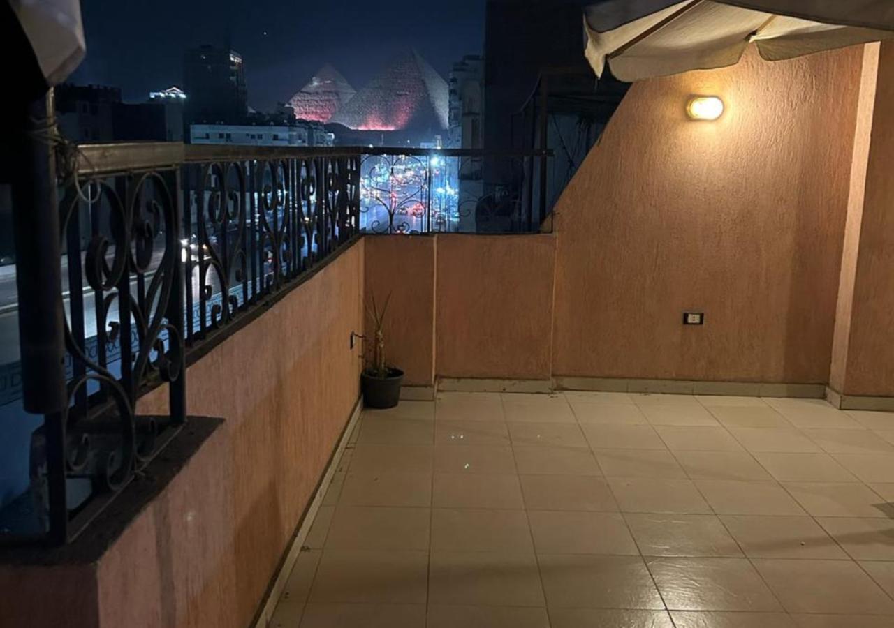 Pyramids Road Guest House Cozy Rooms And Rooftop Breakfast With The Pyramids View Nazlet el-Sisi ภายนอก รูปภาพ